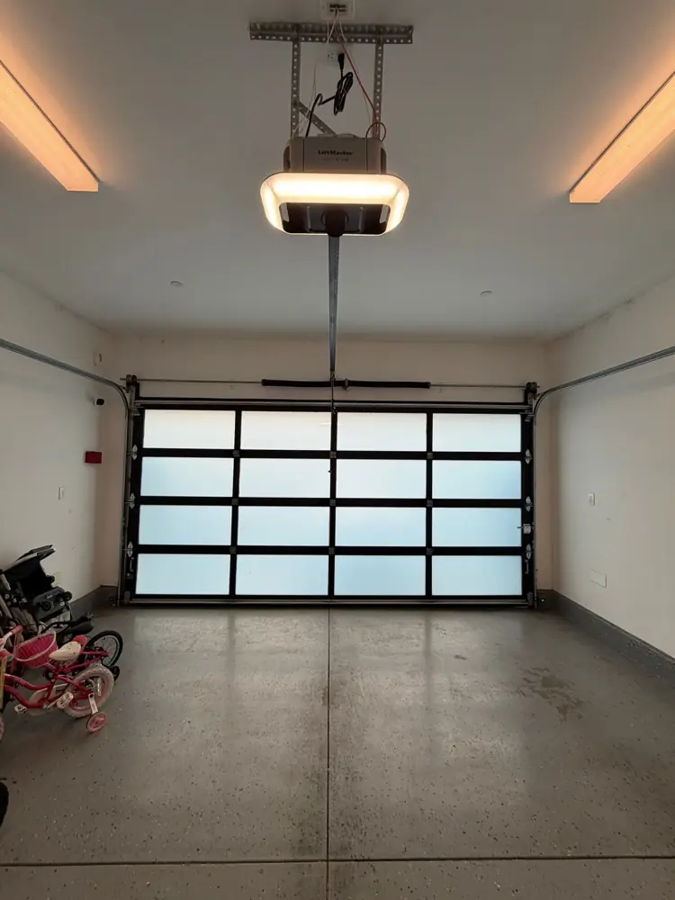 Full-view glass garage door seen from inside the garage