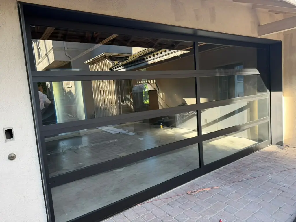Black aluminum full-view glass garage door
