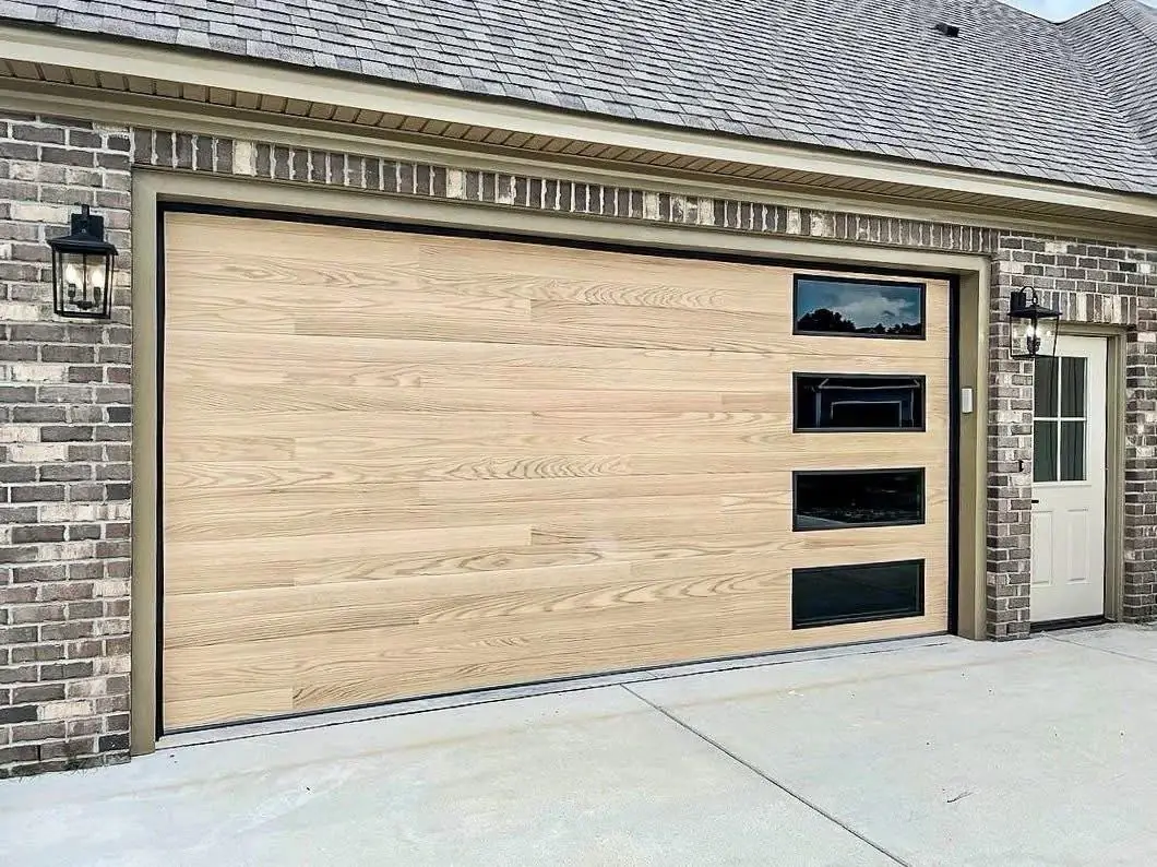 Light wood-look garage door with vertical windows