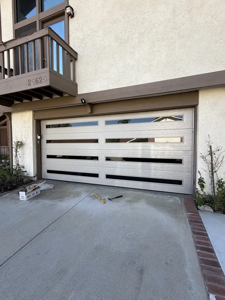 White modern garage door with long window strips