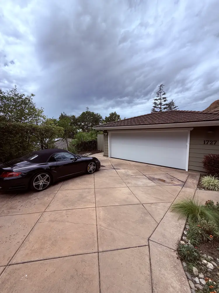 Driveway and garage of a single-story home