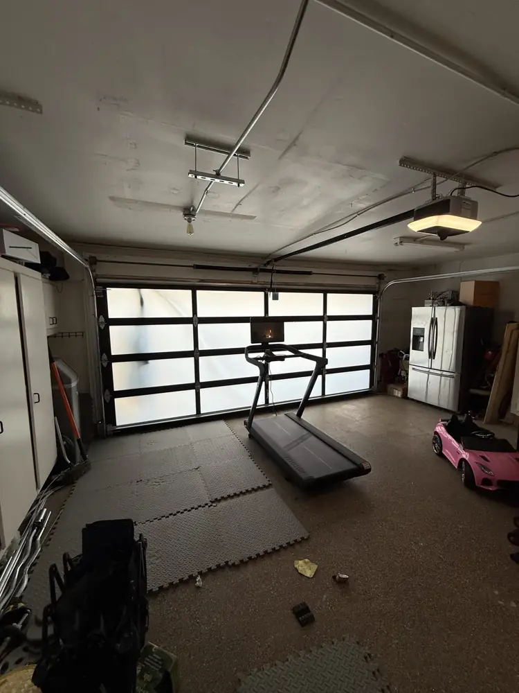 Glass garage door with opener, seen from inside