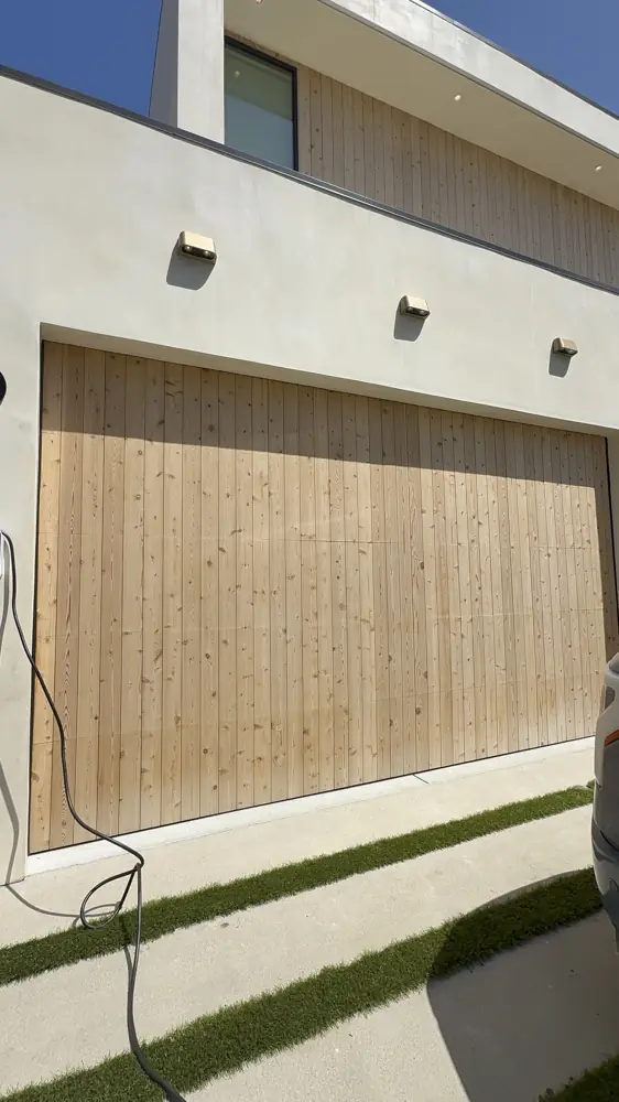 Light wood-look flush garage door