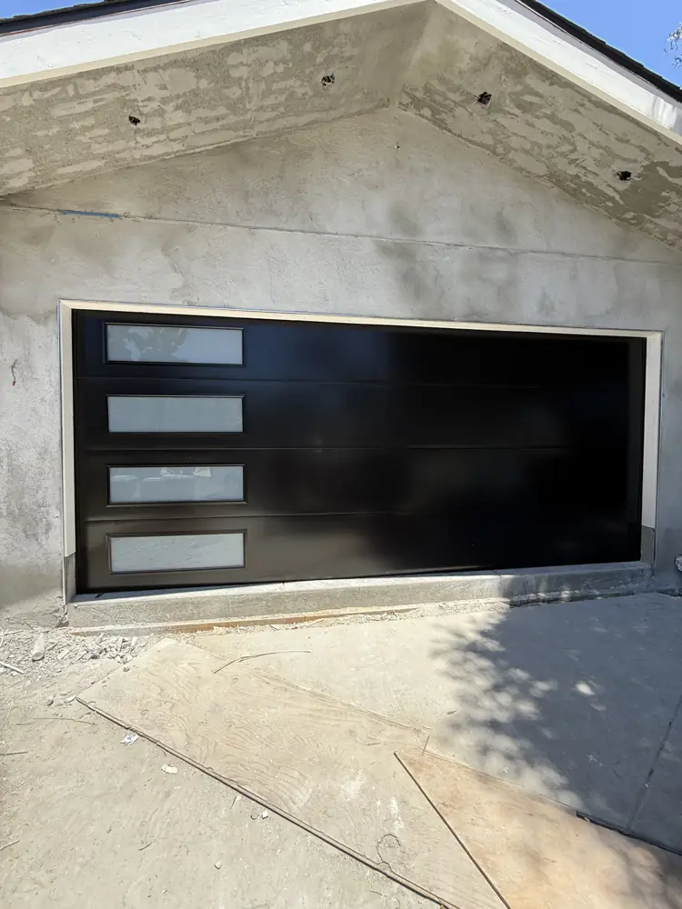Black modern garage door with window column
