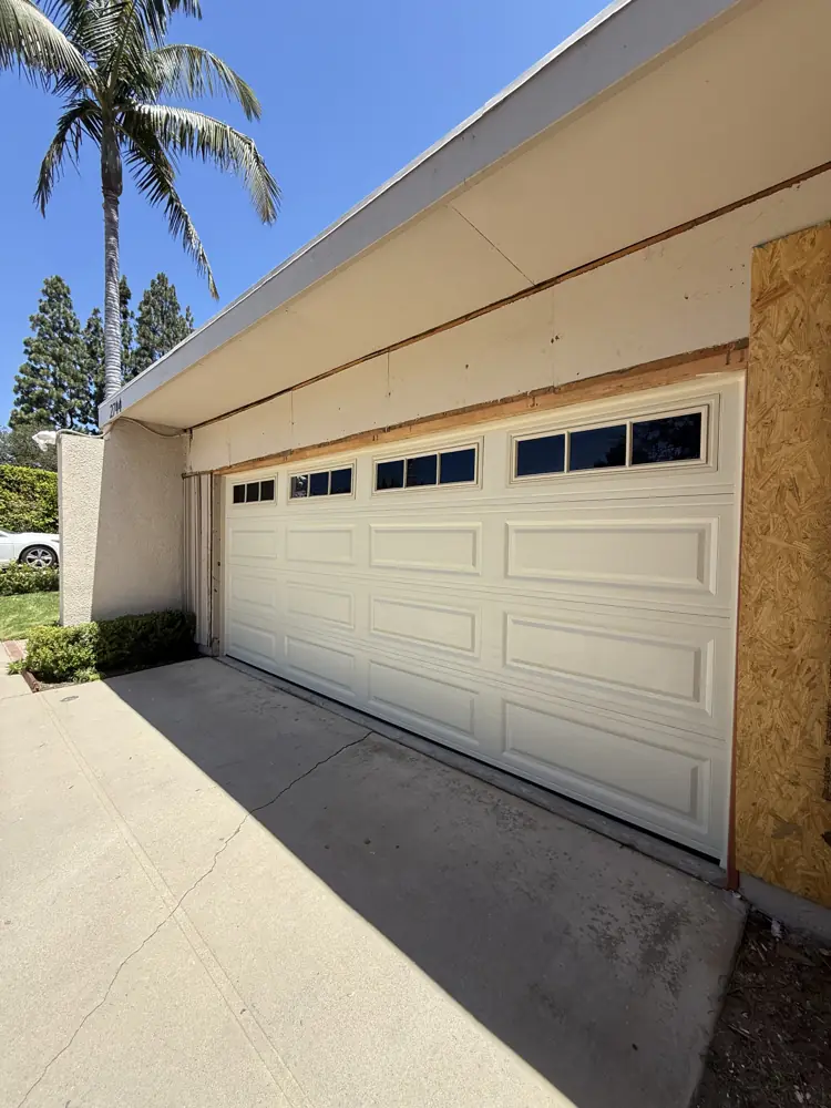 Almond garage door with top windows