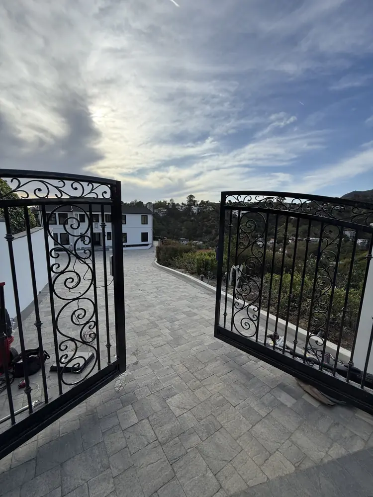 Wrought-iron swing driveway gates