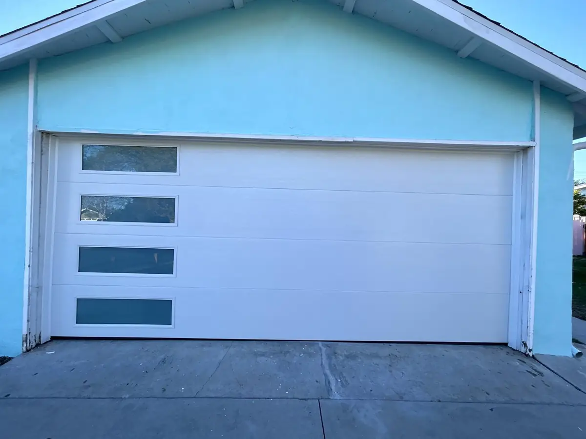 White modern garage door with side window column