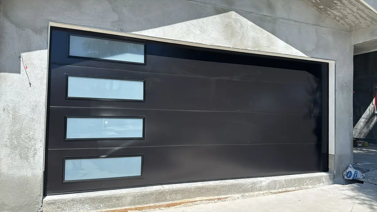 Dark brown modern garage door with frosted windows