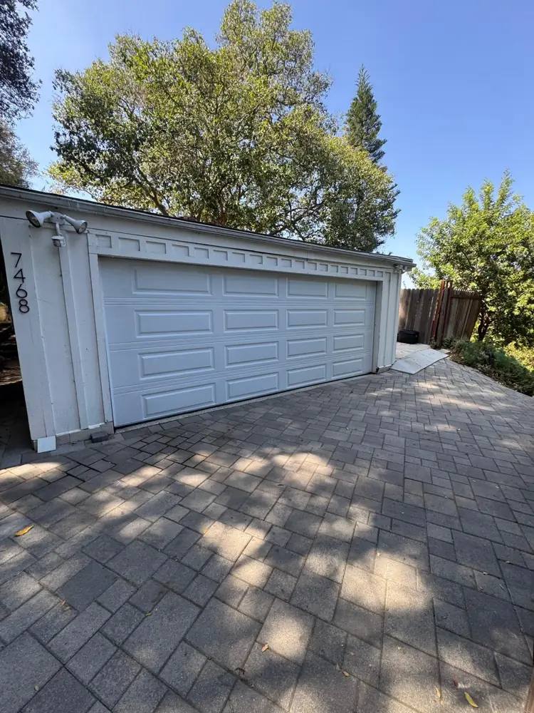 White garage door on a detached garage