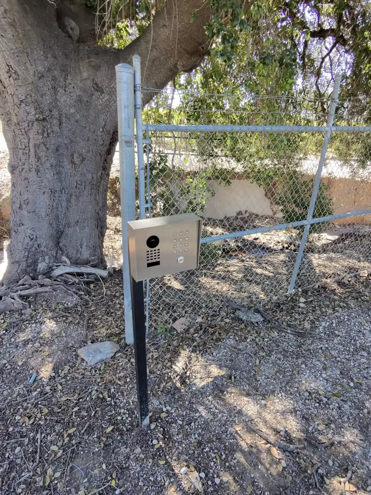 Gate keypad post at a driveway
